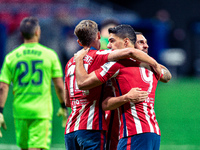 Marcos Llorente, Luis Suarez and Koke celebrates a goal during La Liga match between Atletico de Madrid and Real Betis at Wanda Metropolitan...