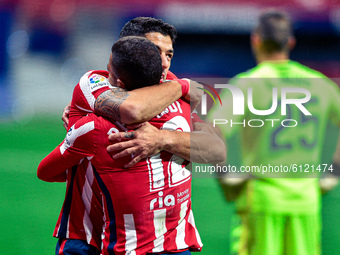 Luis Suarez and Renan Lodi celebrates a goal during La Liga match between Atletico de Madrid and Real Betis at Wanda Metropolitano on Octobe...