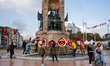 People celebrate the Republic Day of Turkey with Turkish flags and photos of Ataturk on Oc...