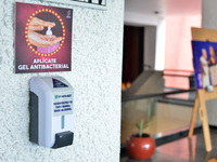 Dispensers of antibacterial solution are placed for people to clean their hands before entering the Hidalgo theater. has been allowed resump...