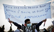 Iraqi refugees living in Greece protest front of the Greek Parliament in in Athens, Greece...
