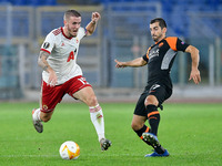 Thibaut Vion of CSKA-Sofia and Henrikh Mkhitaryan of AS Roma compete for the ball during the UEFA Europa League Group A stage match between...