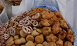 Day of the dead bread are seen in  outdoor market, dead bread are used as ornaments in off...