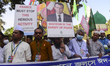 Muslims participate in a rally to mark Eid-e-Miladunnabi, the birthday of the Prophet Moha...