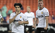 Carlos Soler (L) of Valencia CF celebrate after scoring the 2-2  goal with his teammate To...