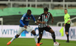 Allan Saint-Maximin of Newcastle United in action with Everton's Niels Nkounkou  during th...