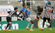 Jamal Lewis of Newcastle United in action with Dominic Calvert-Lewin of Everton  during th...