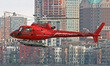 A Liberty Helicopters Eurocopter AS350 arrives at New York Wall Street Heliport on January...