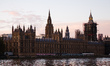 The Houses of Parliament stand beside the River Thames in London, England, on November 6,...