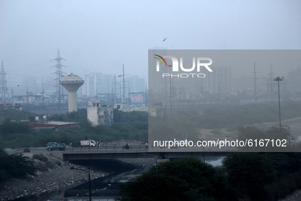 An aerial view of the national capital engulfed in a layer of smoky haze, as the air quality hit 'severe' levels due to stubble burning from...