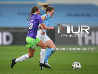 Bristols Niaomi Layzell battles with City Ellen White    during the Barclays FA Women's Super League match between Manchester City and Brist...