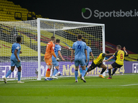 Andre Gray of Watford scores his sides first goal during the Sky Bet Championship match between Watford and Coventry City at Vicarage Road,...
