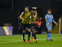 Troy Deeney of Watford celebrates scoring his sides first goal during the Sky Bet Championship match between Watford and Coventry City at Vi...