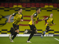 William Troost-Ekong of Watford celebrates scoring his sides first goal during the Sky Bet Championship match between Watford and Coventry C...