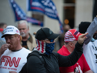 Donald Trump supporters gather in front of the  Pennsylvania Convention Center, claiming that Biden and the Democrats were stealing the elec...