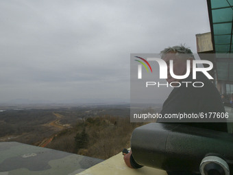 Visitor look demilitarized zone and North Korean gaepung vill, view from Odusan military observation post in Paju, South Korea on Feb 15, 20...