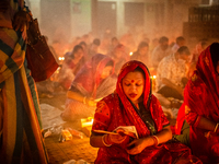 The disciples of Baba Lokenath Brahmachari celebrated Rakher Upobash or Kartik Broto through fasting until lighting lamps in the evening at...