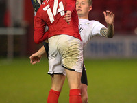  Peterboroughs Frankie Kent clashes with Crews Oliver Finney during the Sky Bet League 1 match between Crewe Alexandra and Peterborough at A...
