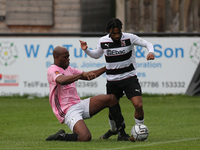 Theo Streete of AFC Telford battles with Darlington's Erico Sousa during the Vanarama National League North match between Darlington and AFC...