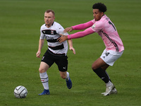 Adam Campbell of Darlington in action with Dominic McHale of AFC Telford  during the Vanarama National League North match between Darlington...