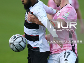 Erico Sousa of Darlington battles with Zak Lilly of AFC Telford  during the Vanarama National League North match between Darlington and AFC...