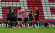  Grant Leadbitter left reeling from a heavy challenge by Carlton Morris during the Sky Bet...