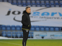Colchesters Manager Steve Ball watches on during the Sky Bet League 2 match between Colchester United and Leyton Orient at the Weston Homes...