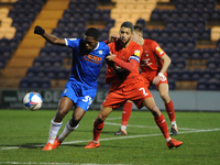 Colchesters Michael Folivi And Leyton Orients Jobi McAnuff during the Sky Bet League 2 match between Colchester United and Leyton Orient at...