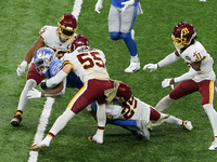 Wide receiver Quintez Cephus (87) of the Detroit Lions is taken down by cornerback Kendall Fuller (29) of the Washington Football Team, and...