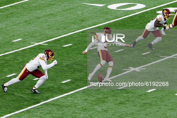 Kicker Dustin Hopkins (3) of the Washington Football Team kicks to the Lions during the second half of an NFL football game between the Wash...