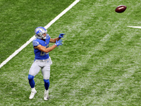 Wide receiver Danny Amendola (80) of the Detroit Lions catches the ball during warmups before the first half of an NFL football game between...