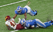 Washington Football Team running back J.D. McKissic (41) is tackled by Detroit Lions outsi...