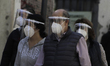 A large number of people walk along the Madero corridor in the Zócalo of Mexico City as pa...