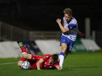 Hartlepool United's Lewis Cass battles for possession with Luke Young of Wrexham during the Vanarama National League match between Hartlepoo...