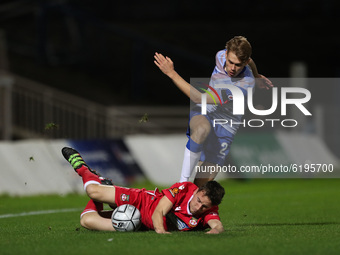 Hartlepool United's Lewis Cass battles for possession with Luke Young of Wrexham during the Vanarama National League match between Hartlepoo...