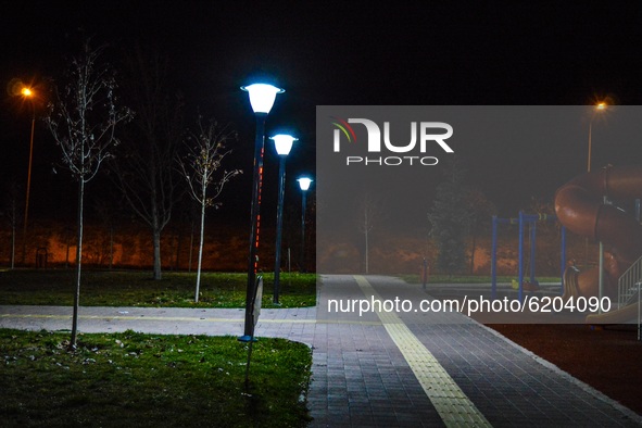 A deserted park is pictured during the start of a fourteen-hour partial weekend curfew amid the coronavirus (COVID-19) pandemic on November...