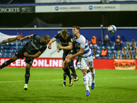Rotheram's Michael Smith scores a header during the Sky Bet Championship match between Queens Park Rangers and Rotherham United at Loftus Ro...