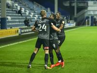 Rotheram's Michael Smith celebrates his goal woth team-mates during the Sky Bet Championship match between Queens Park Rangers and Rotherham...