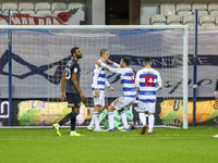 QPRs Lyndon Dykes scores a penalty & celebrates with team-mates during the Sky Bet Championship match between Queens Park Rangers and Rother...