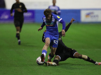  Barrow's Luke James battles for possession with Raphael Diarra of Oldham Athletic  during the Sky Bet League 2 match between Barrow and Old...