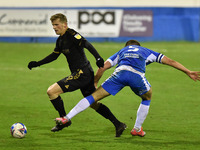   Oldham Athletic's Danny Rowe tussles with Barrow's Matthew Platt during the Sky Bet League 2 match between Barrow and Oldham Athletic at t...