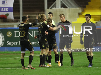 Danny Rowe celebrates with his team mates after scoring their  third goal from the penalty spot   during the Sky Bet League 2 match between...