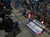 Neapolitan fans pay tribute outside of 'San Paolo' Stadium where in 1987 Maradona played and lead the local team to win the national league,...