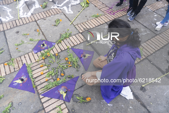 A woman participates in the Day of non-violence against women in Bogota, Colombia, on November 25, 2020 