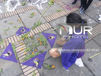 A woman participates in the Day of non-violence against women in Bogota, Colombia, on November 25, 2020 (