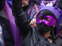 A woman with a mask participate in the Day of non-violence against women in Bogota, Colombia, on November 25, 2020 (