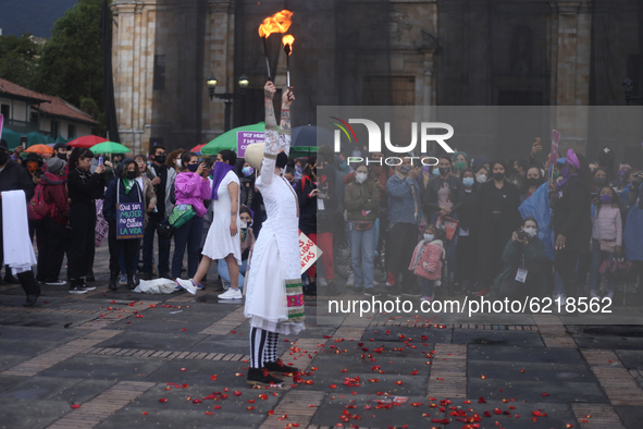 A woman participates in the Day of non-violence against women in Bogota, Colombia, on November 25, 2020. 