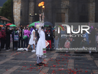 A woman participates in the Day of non-violence against women in Bogota, Colombia, on November 25, 2020. (