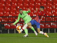  Charis Mavrias, of AC Omonoia and Carlos Neva, of Granada CF  during the UEFA Europa League Group E stage match between Granada CF and AC O...