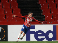 Alberto Soro of Granada celebrates after scoring his sides first goal during the UEFA Europa League Group E stage match between Granada CF a...